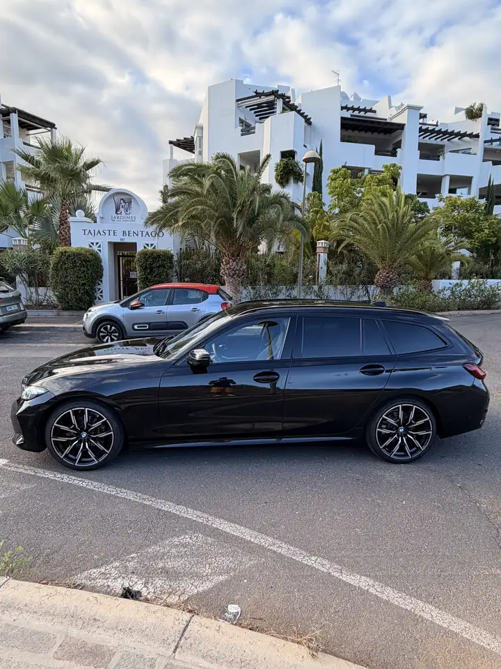 BMW 320 320i Touring c/clima auto — معرض صور السيارة 4