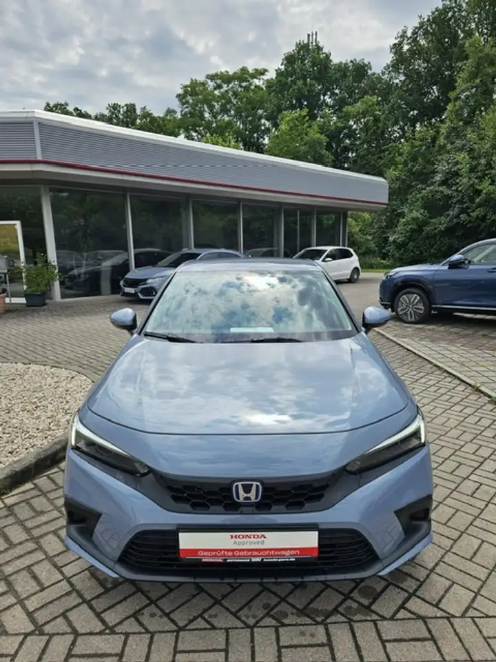 Honda Civic e:HEV 2.0 i-MMD Hybrid Elegance — معرض صور السيارة 2