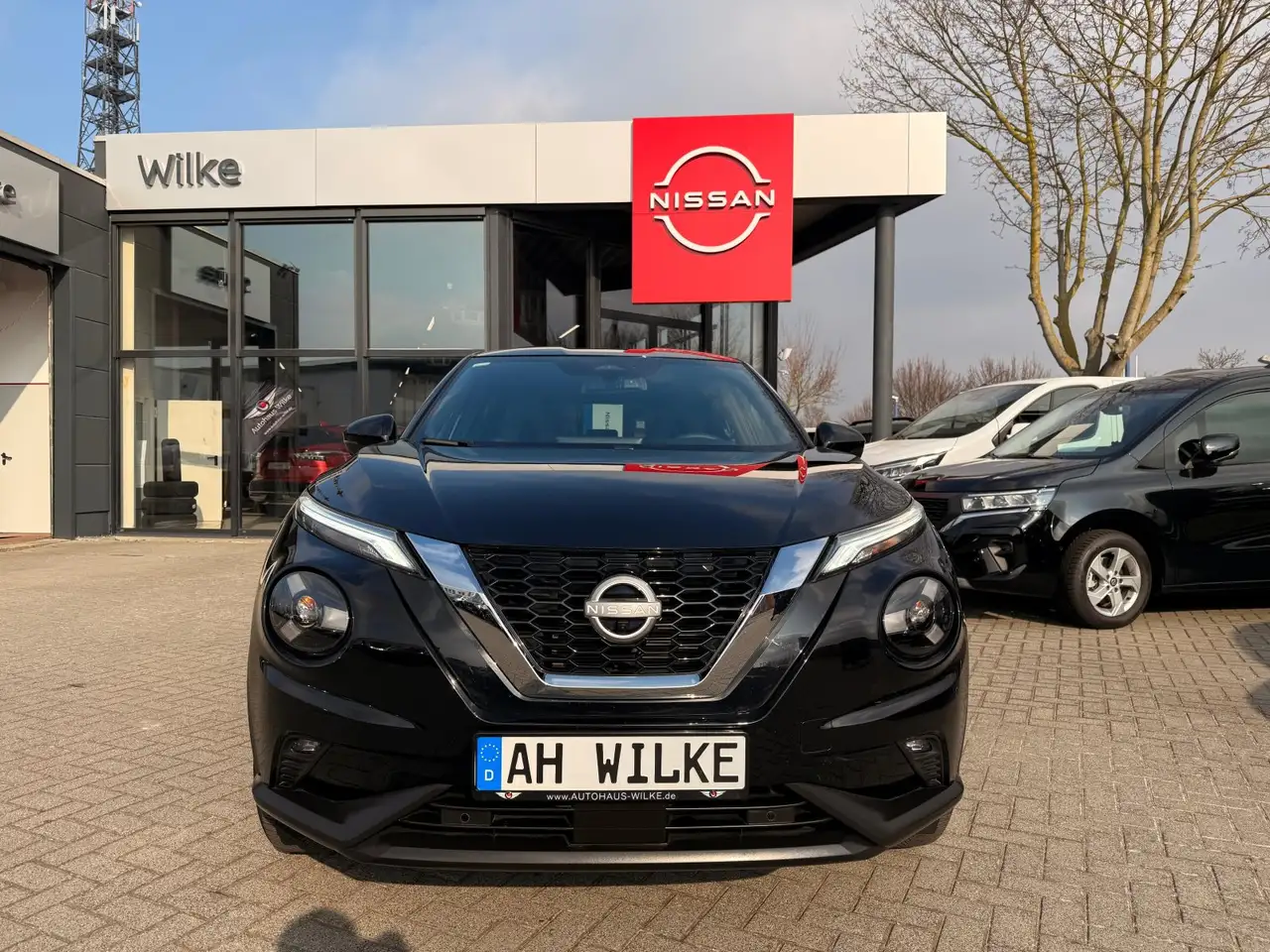 Nissan Juke 1.0 DIG-T DCT TEKNA/LEDER/360°/NAVI/LED — معرض صور السيارة 2