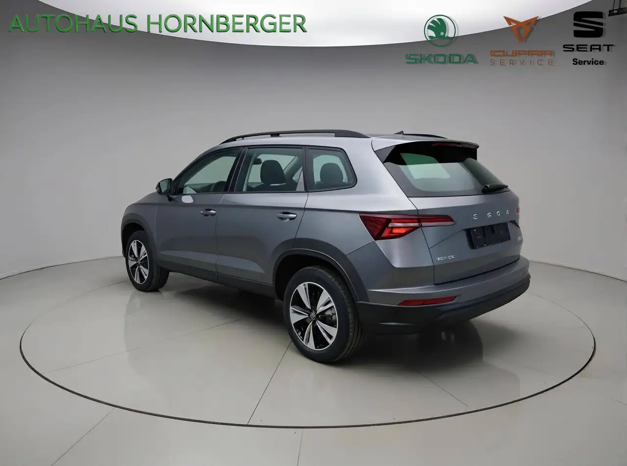Skoda Karoq Style Plus 1.5TSI 150PS Navi ACC LED PDC Kamera 17" Alufelgen Fahrprofil Tempomat Sitzheizung Kessy Wireless Charging — Galerie du véhicule 3