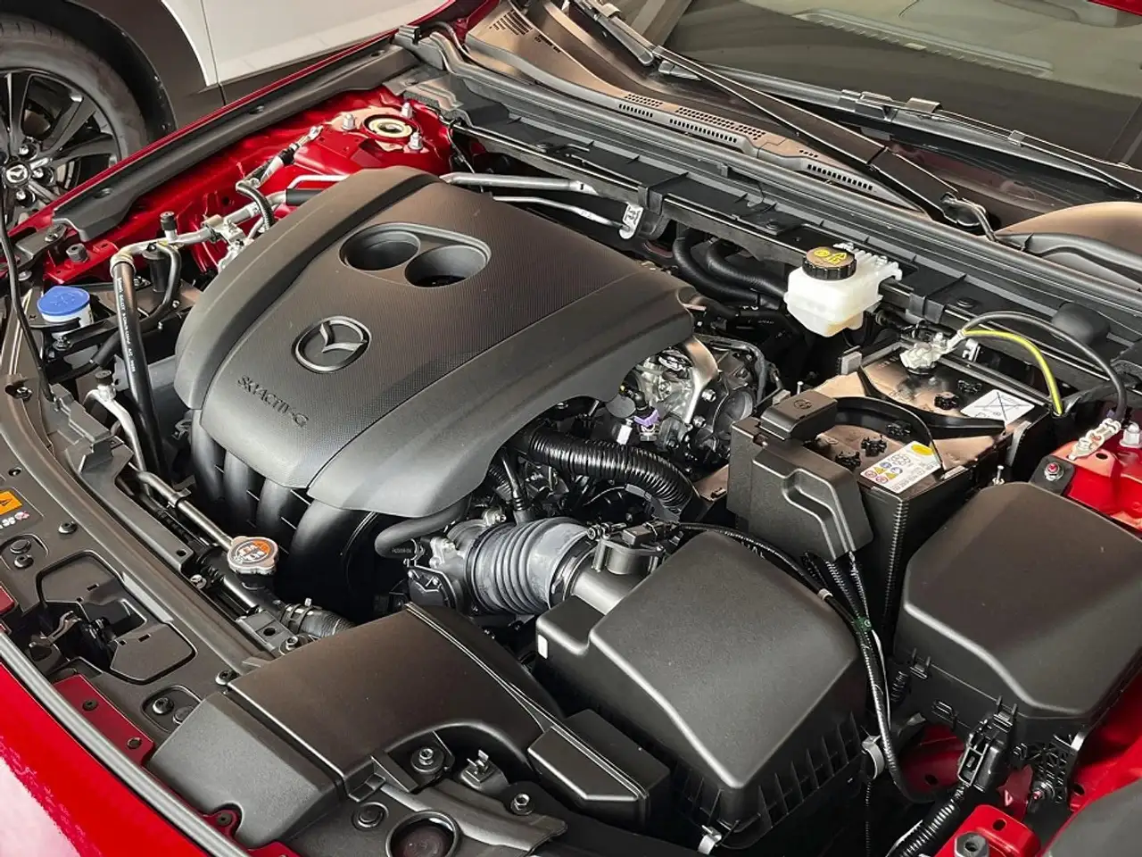 Mazda 3 2.0L e-SKYACTIV G 122PS HOMURA TAGESZUL. — معرض صور السيارة 10