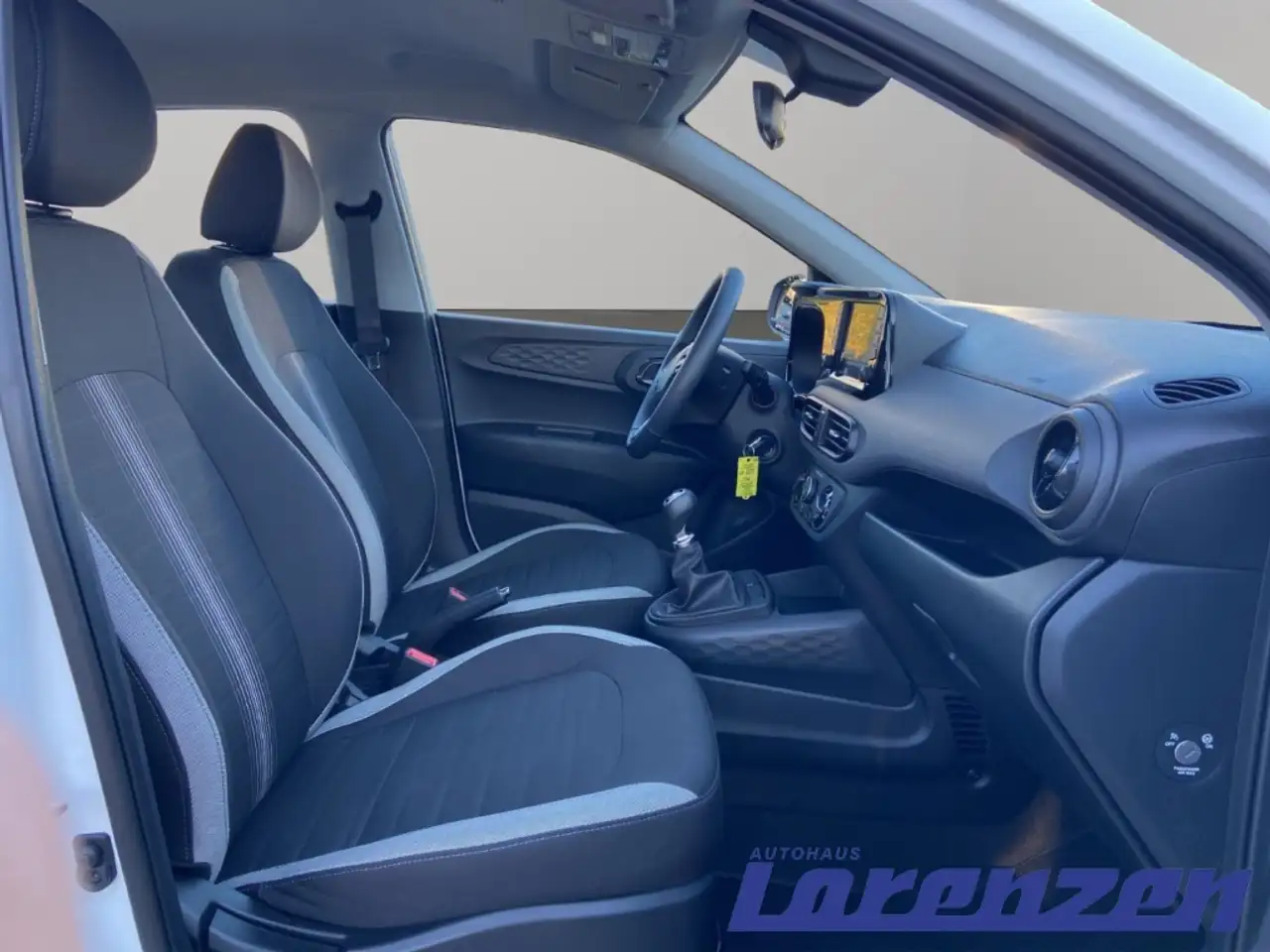 Hyundai i10 FL (MY25) 1.0 (63 PS) Select Navi Apple CarPlay An — معرض صور السيارة 9