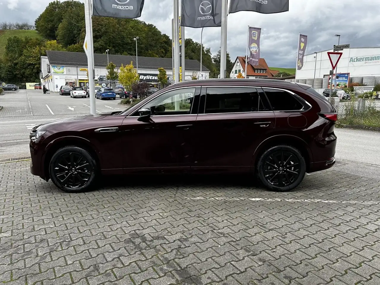 Mazda CX-80 2.5L e-SKYACTIV PHEV 327ps 8AT AWD Homura Plus — معرض صور السيارة 3